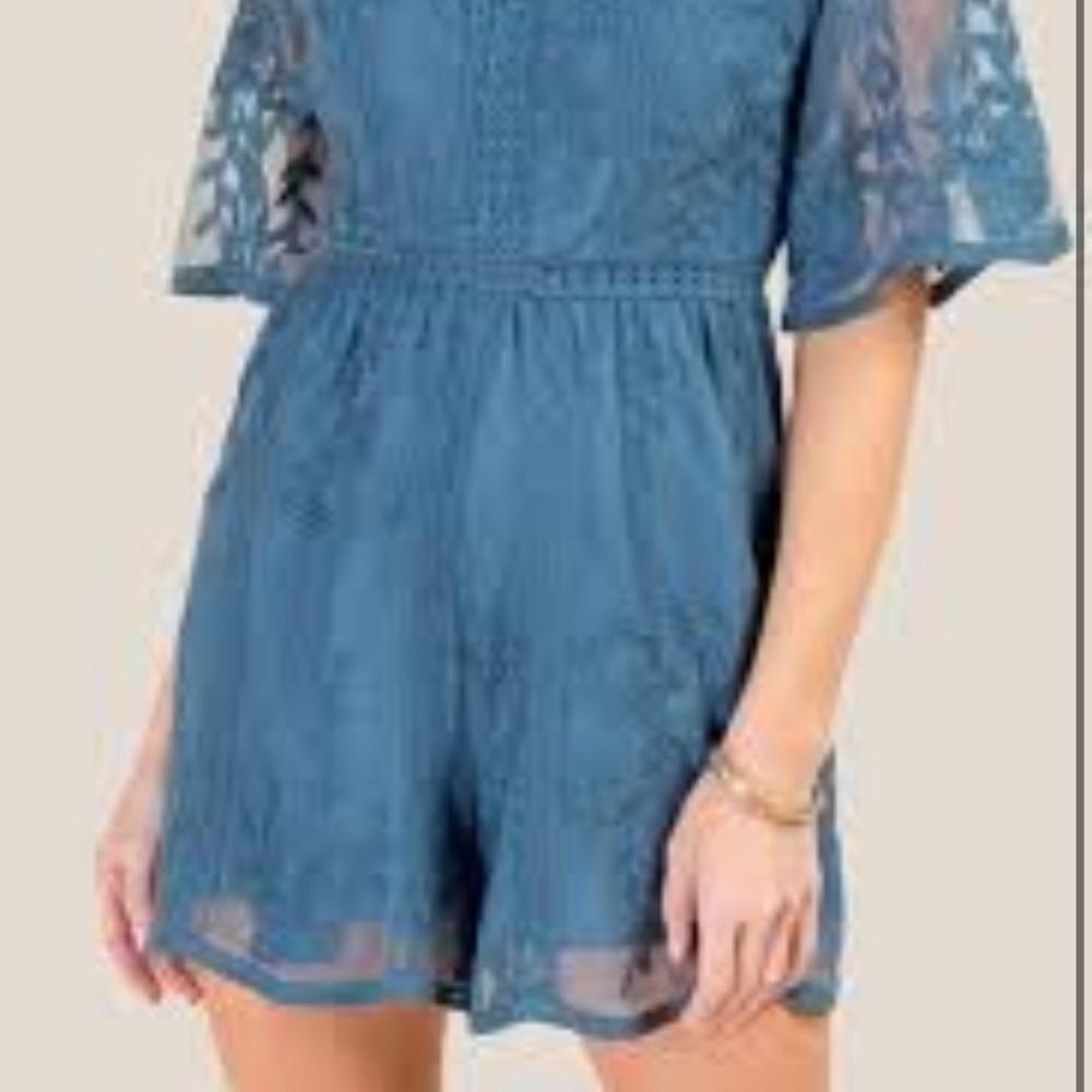 Floral embroidered romper!